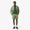 Polo L.12.12 de corte clásico con detalle de bolsillo para hombre
