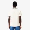 Polo L.12.12 de corte clásico con detalle de bolsillo para hombre