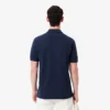 Polo L.12.12 de corte clásico con rayas llamativas para hombre