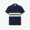 Polo L.12.12 de corte clásico con rayas llamativas para hombre