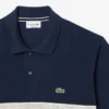 Polo L.12.12 de corte clásico con rayas llamativas para hombre