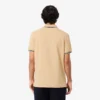 Polo L.12.12 de corte regular con detalles decorativos para hombre
