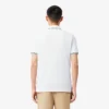 Polo L.12.12 de corte regular con detalles decorativos para hombre