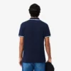 Polo L.12.12 de corte regular con detalles decorativos para hombre