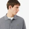 Polo L.12.12 jaspeado de corte clásico para hombre
