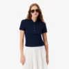 Polo L.12.D de mujer, corte ajustado y elástico, con tejido piqué