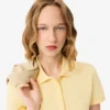 Polo L.12.D de mujer, corte ajustado y elástico, con tejido piqué