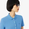 Polo L.12.D de mujer, corte ajustado y elástico, con tejido piqué