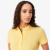 Polo L.12.D de mujer, corte ajustado y elástico, con tejido piqué