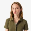 Polo L.12.D de mujer, corte ajustado y elástico, con tejido piqué