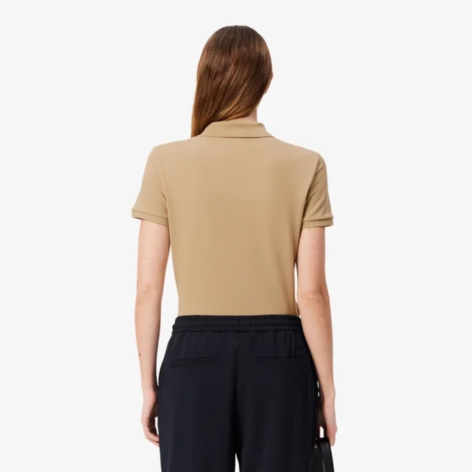 Polo L.12.D de mujer, corte ajustado y elástico, con tejido piqué