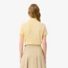 Polo L.12.D de mujer, corte ajustado y elástico, con tejido piqué