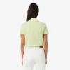 Polo L.12.D de mujer, corte ajustado y elástico, con tejido piqué