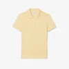 Polo L.12.D de mujer, corte ajustado y elástico, con tejido piqué