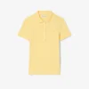Polo L.12.D de mujer, corte ajustado y elástico, con tejido piqué