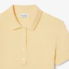 Polo L.12.D de mujer, corte ajustado y elástico, con tejido piqué