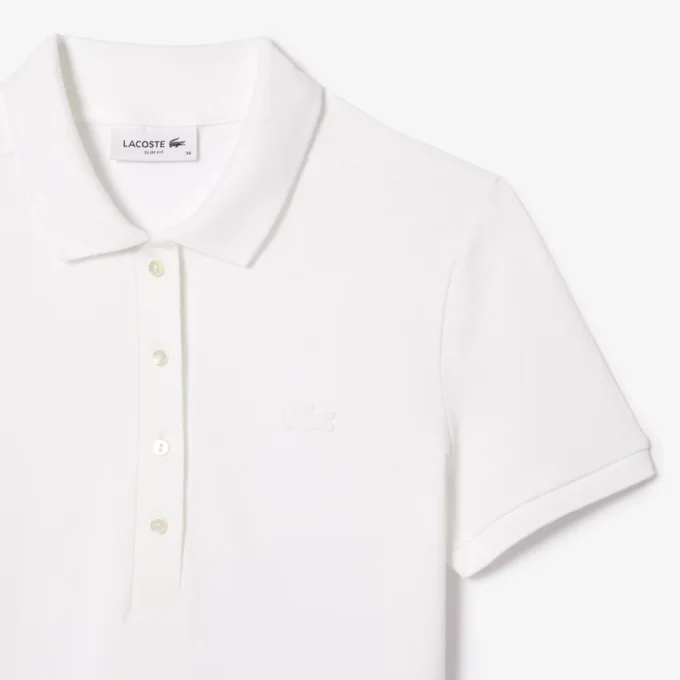 Polo L.12.D de mujer, corte ajustado y elástico, con tejido piqué