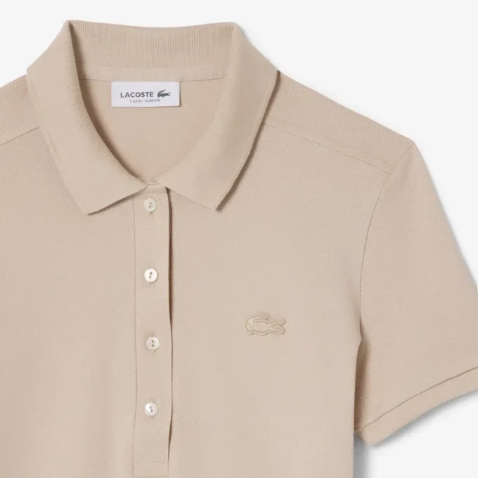 Polo L.12.D de mujer, corte ajustado y elástico, con tejido piqué