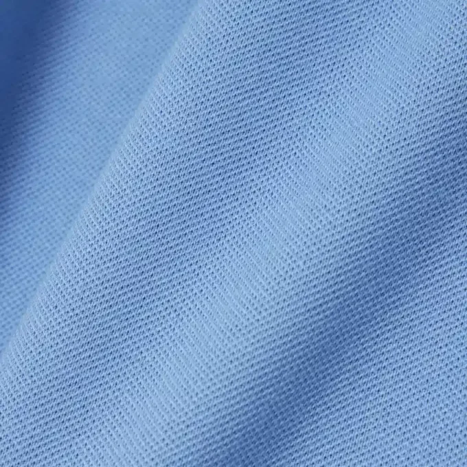 Polo L.12.D de mujer, corte ajustado y elástico, con tejido piqué