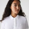 Polo L.12.D de mujer, corte ajustado y elástico, con tejido piqué