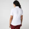 Polo L.12.D de mujer, corte ajustado y elástico, con tejido piqué