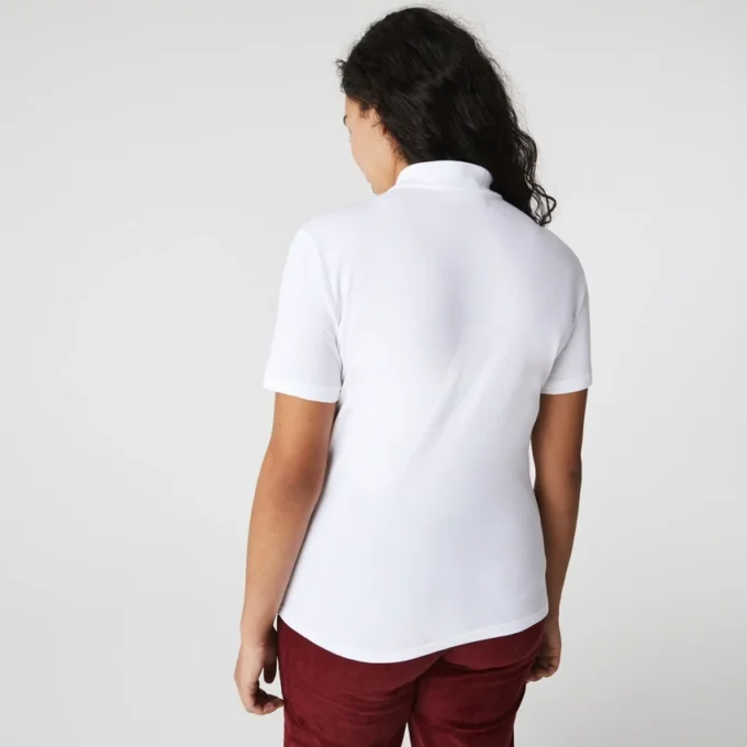 Polo L.12.D de mujer, corte ajustado y elástico, con tejido piqué
