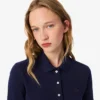 Polo L.12.D de mujer, corte ajustado y tejido elástico