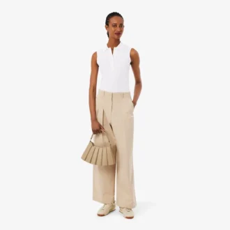 Polo sin mangas elástico L.12.D de corte ajustado para mujer