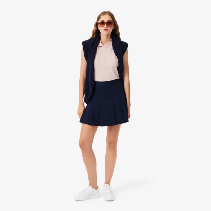 Polo sin mangas elástico L.12.D de corte ajustado para mujer