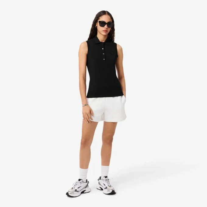 Polo sin mangas elástico L.12.D de corte ajustado para mujer