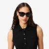 Polo sin mangas elástico L.12.D de corte ajustado para mujer