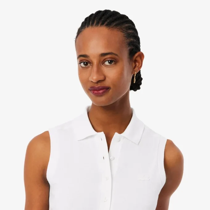 Polo sin mangas elástico L.12.D de corte ajustado para mujer