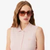 Polo sin mangas elástico L.12.D de corte ajustado para mujer