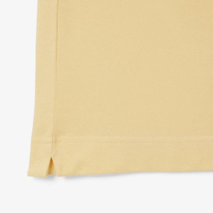 Polo unisex de corte clásico con estampado característico L.12.12