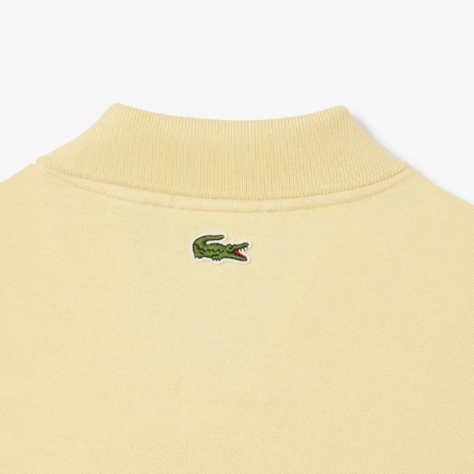 Polo unisex de corte clásico con estampado característico L.12.12