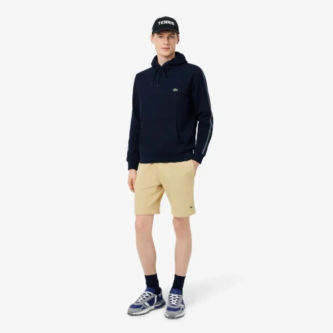 Sudadera con capucha, cremallera y banda con el logotipo