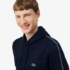 Sudadera con capucha, cremallera y banda con el logotipo