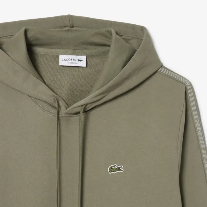 Sudadera con capucha, cremallera y banda con el logotipo