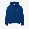 Sudadera con capucha unisex de corte holgado y detalle de insignia