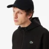 Sudadera con capucha y cremallera de deporte elástica