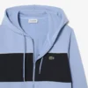 Sudadera con capucha y cremallera en bloques de color