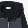 Sudadera con capucha y cremallera en bloques de color