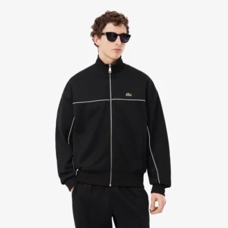 Sudadera con cremallera y detalles decorativos
