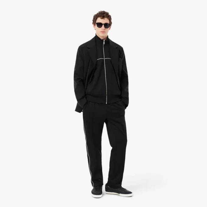 Sudadera con cremallera y detalles decorativos