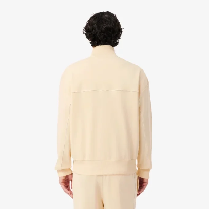 Sudadera con cremallera y detalles decorativos