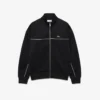 Sudadera con cremallera y detalles decorativos