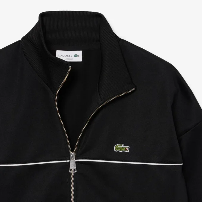 Sudadera con cremallera y detalles decorativos