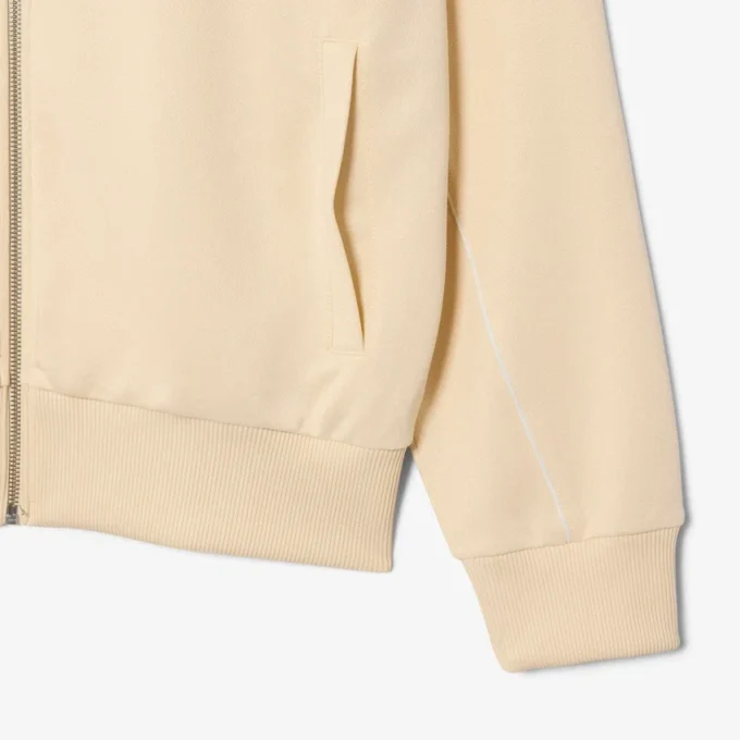 Sudadera con cremallera y detalles decorativos