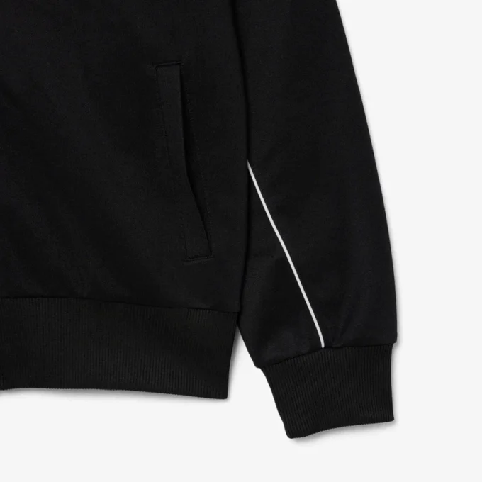 Sudadera con cremallera y detalles decorativos