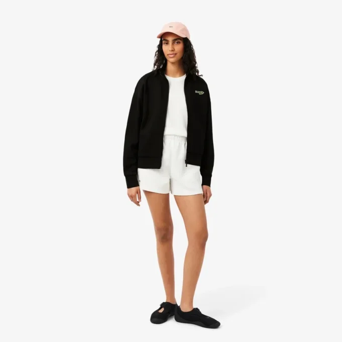 Sudadera con cremallera y insignia de corte holgado
